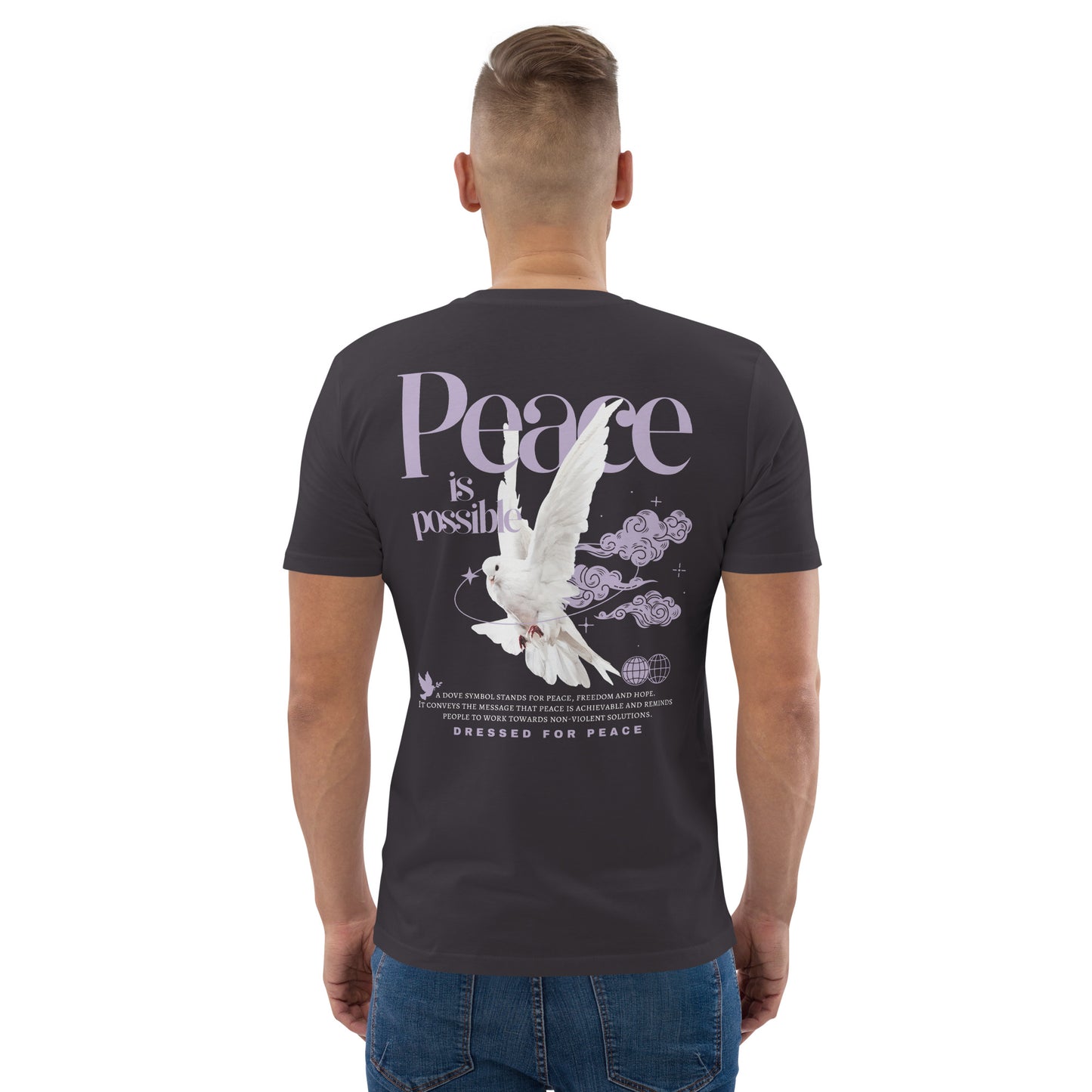 Person wearing a black t-shirt with a dove and 'Peace is possible' text on the back.