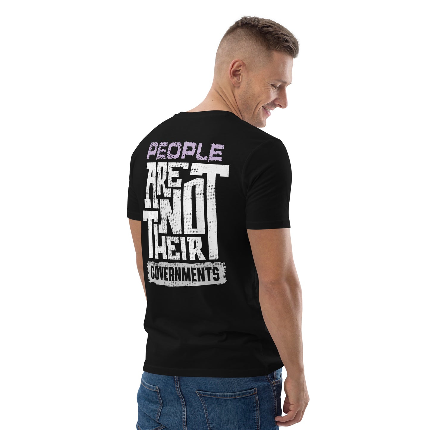Man wearing a black t-shirt with a motivational quote on the back, standing against a white background.
