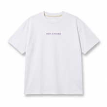 Organic cotton white unisex t-shirt with purple/ lila embroidery: peace is possible
