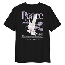 Black t-shirt with a white dove and 'Peace is Possible' text on a white background