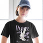 Person wearing a black t-shirt with 'Peace is possible' design and a blue cap.