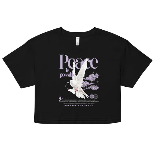 Black crop top with 'Peace is possible' graphic design on a white background